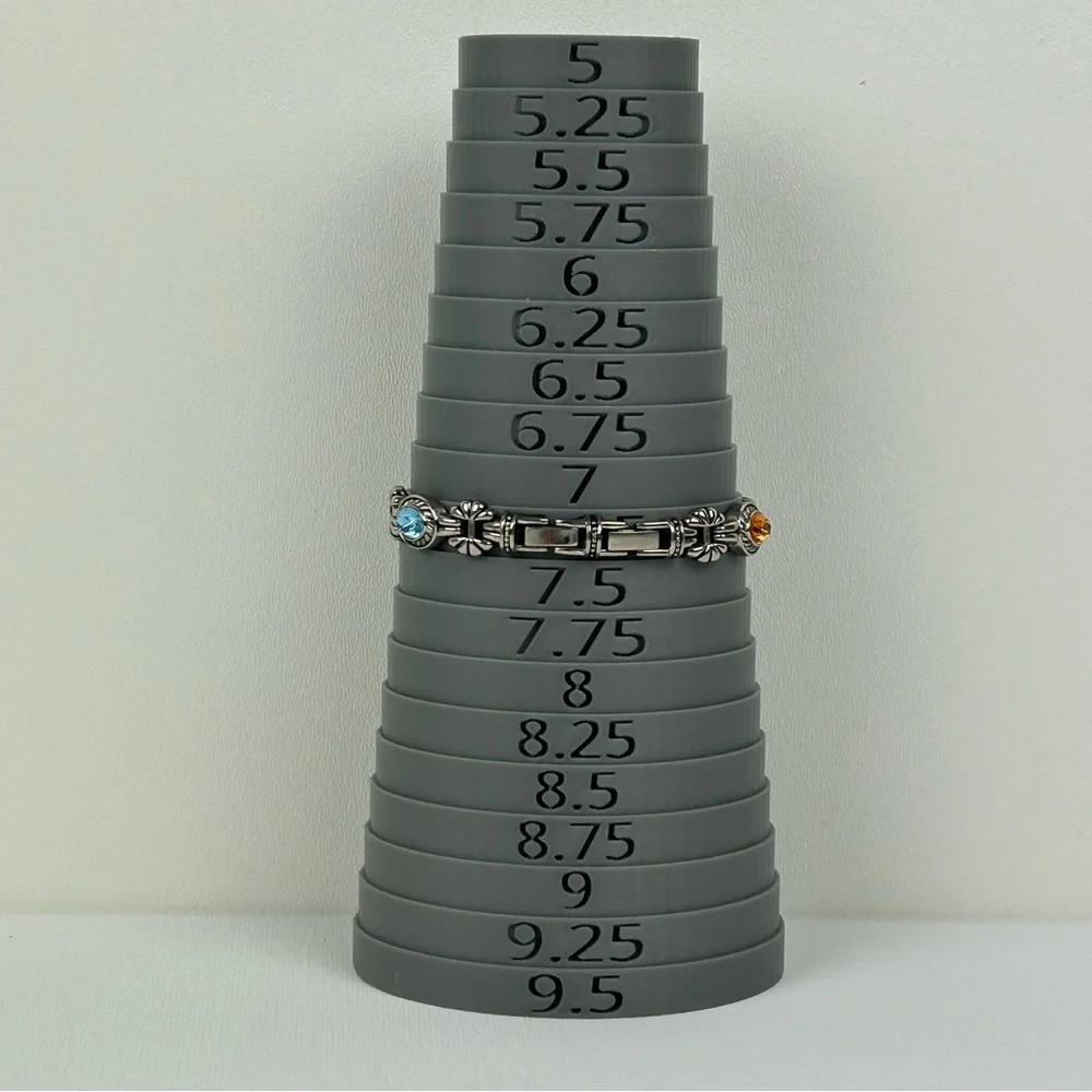 Elegant Silver Tone Quartz watch with Pink, Green, Gold and Blue Accents
